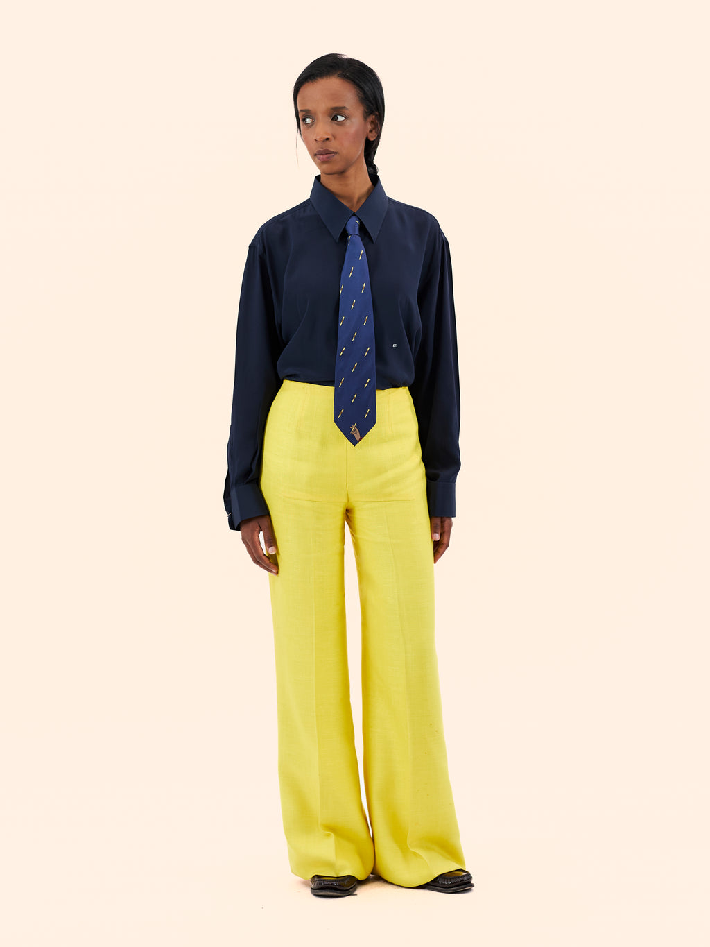 COURREGES NAVY WOOL COAT WITH YELLOW LINEN TROUSERS