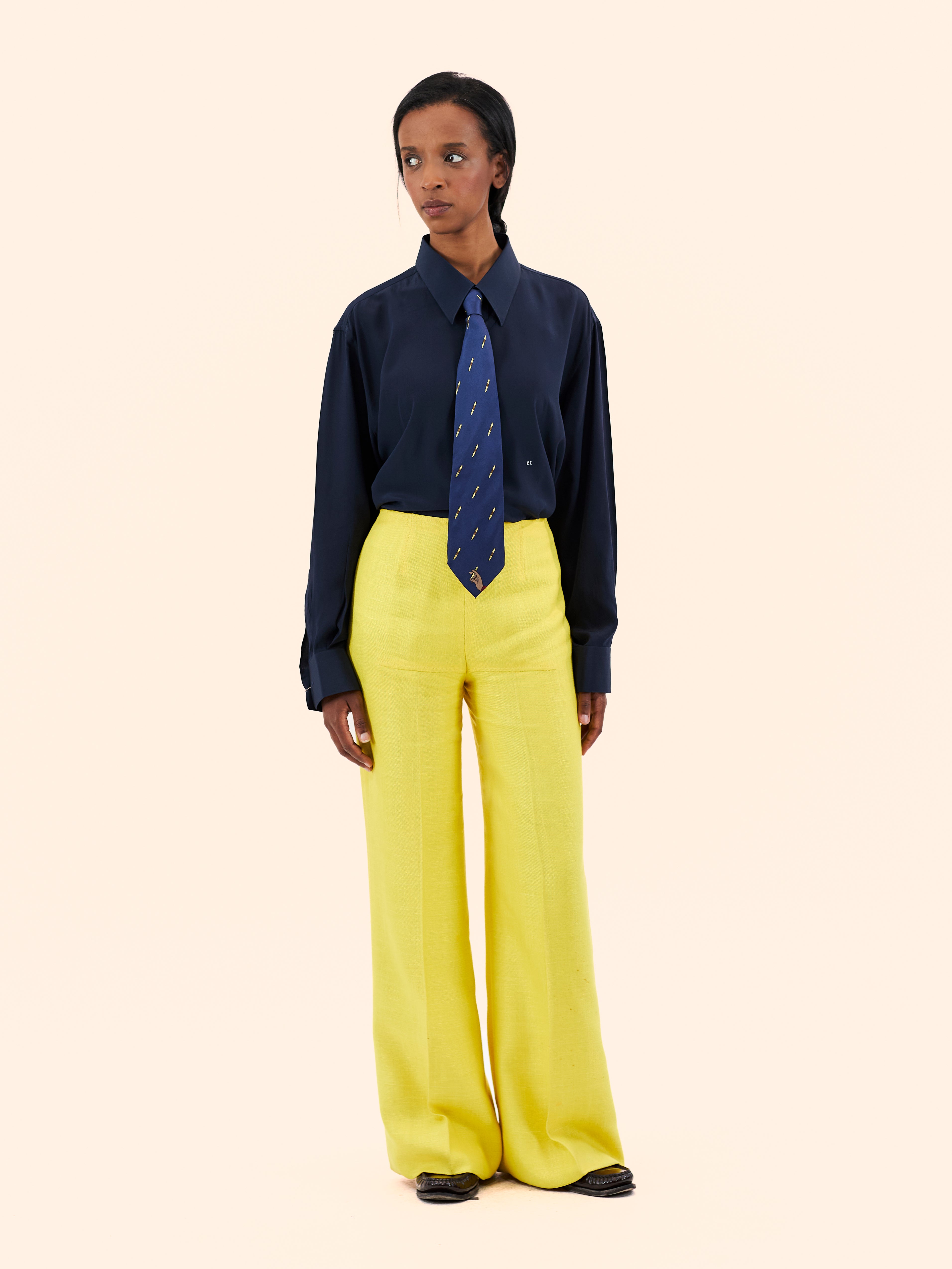 COURREGES NAVY WOOL COAT WITH YELLOW LINEN TROUSERS