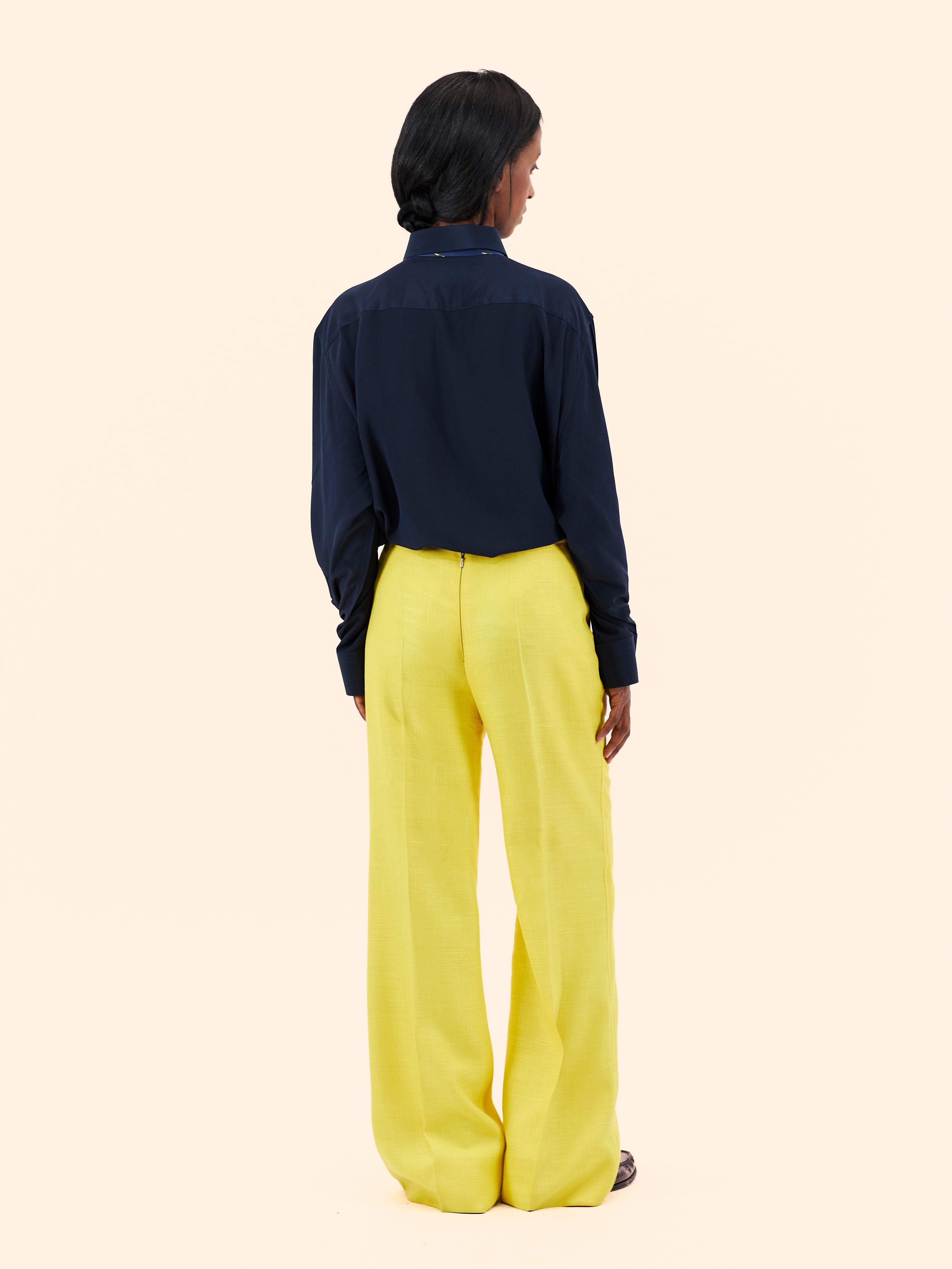 COURREGES NAVY WOOL COAT WITH YELLOW LINEN TROUSERS