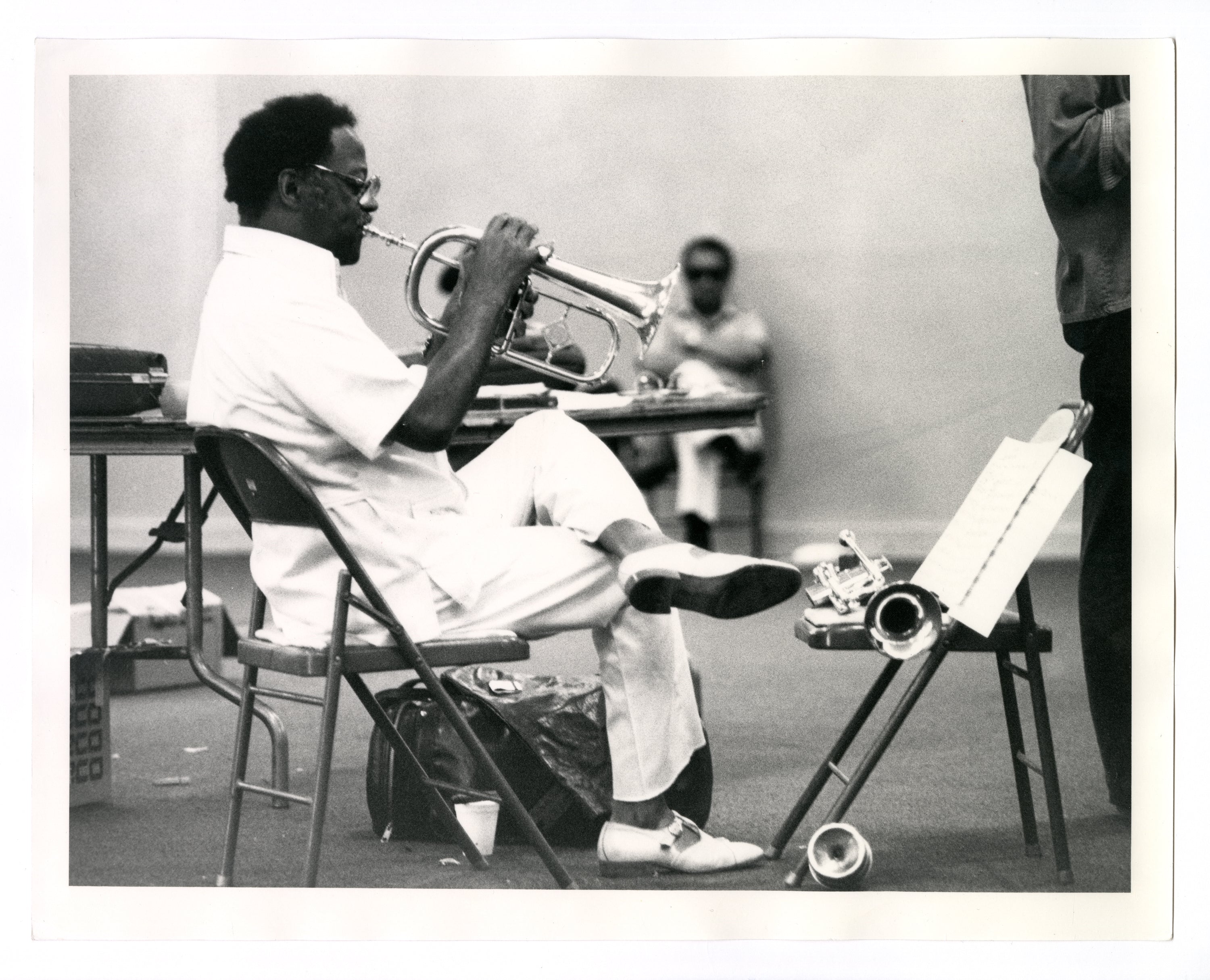 CLARK TERRY PLAYING A TUBA DURING A REHEARSAL AT THE MONTEREY JAZZ FESTIVAL, CA, 1981 BY TED WILLIAMS