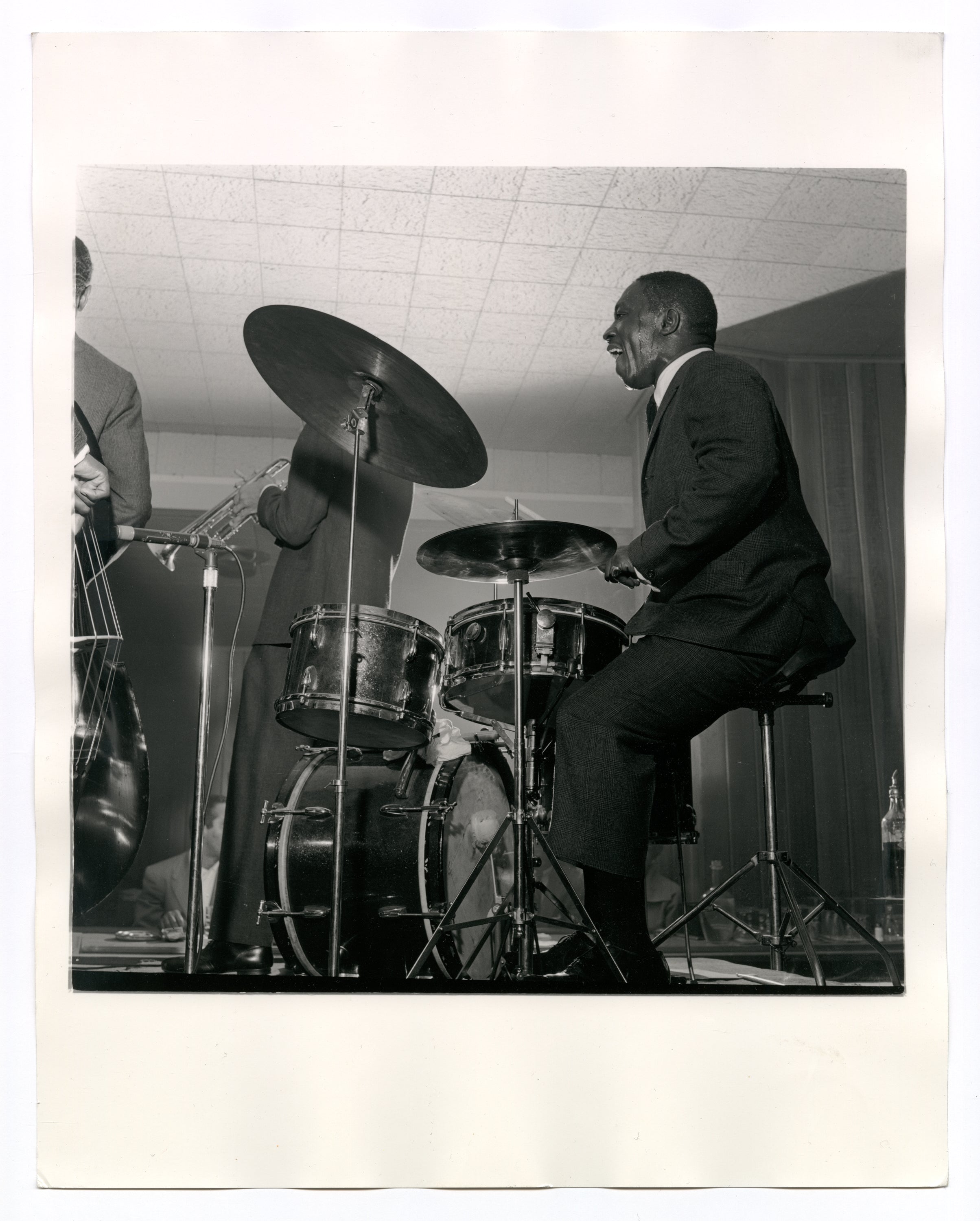 ART BLAKEY PLAYING THE DRUMS ON STAGE ALONGSIDE THE JAZZ MESSENGERS AT THE SUTHERLAND LOUNGE, CHICAGO, IL BY TED WILLIAMS